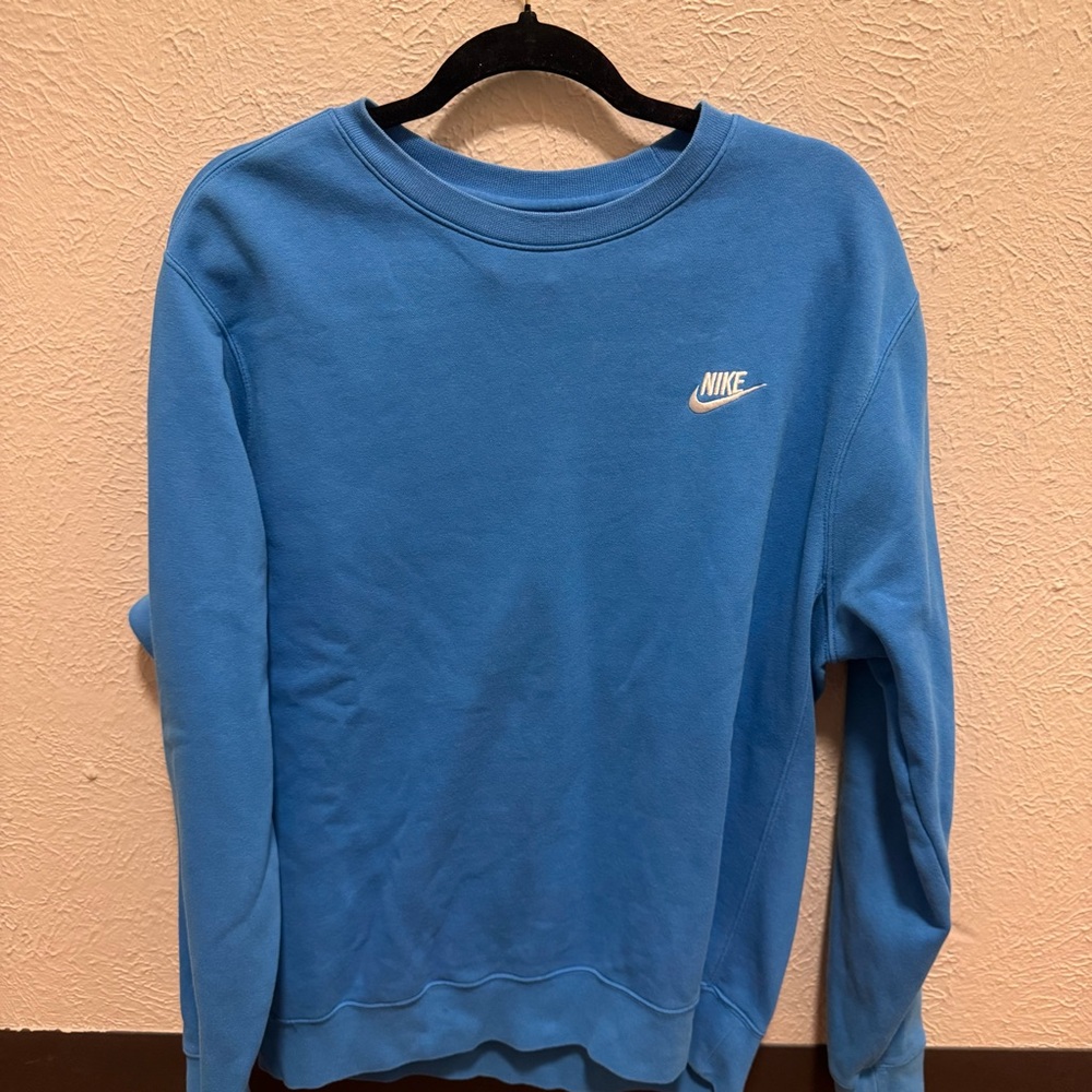 Blue Nike sweatshirt